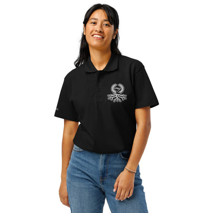 Woman wearing black pique polo white embroidered Zaylachi Origine logo streetwear | Zaylachi Co.